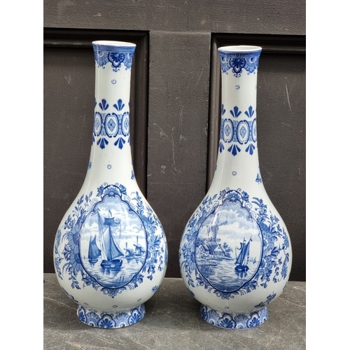 1333 - A pair of Dutch Delft baluster vases, 39.5cm high.