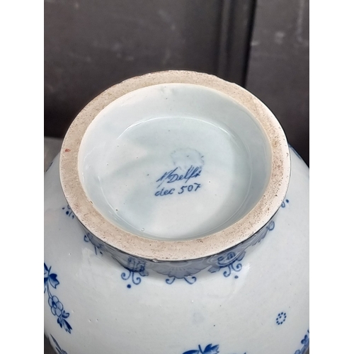 1333 - A pair of Dutch Delft baluster vases, 39.5cm high.