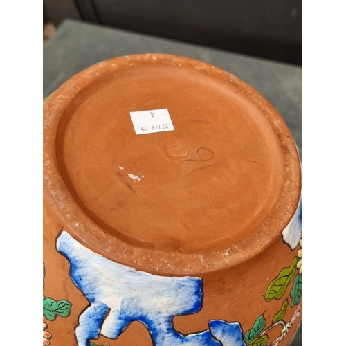 1334 - A terracotta ovoid base, enamelled in the Chinese style, possible Wedgwood, 25.5cm high; together wi... 