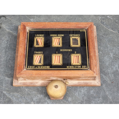 1336 - An early 20th century servants bell box, 30 x 30cm.