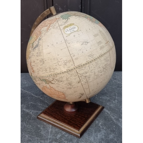 1341 - A reproduction George F Cram 'Classic' globe, 31.5cm high.