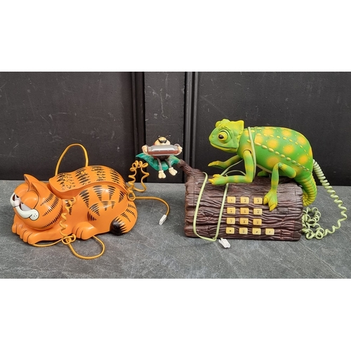 1346 - Two novelty telephones, comprising 'Garfield'; and 'Karma Chameleon' examples. (2)