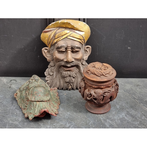 1347 - An Eastern carved wood cup and cover, decorated with dragons, 16.5cm high; together with an Indian c... 