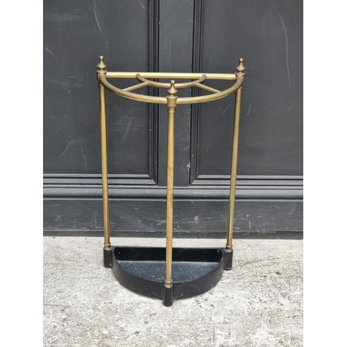 1356 - A brass semi-circular stick stand, 35cm wide.