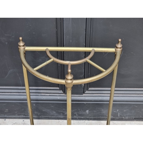 1356 - A brass semi-circular stick stand, 35cm wide.