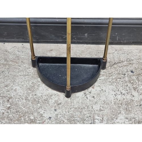 1356 - A brass semi-circular stick stand, 35cm wide.