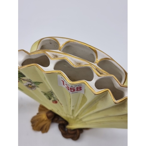 1358 - A very unusual pair of Victorian Royal Worcester fan vases, circa 1880, each painted with wildflower... 