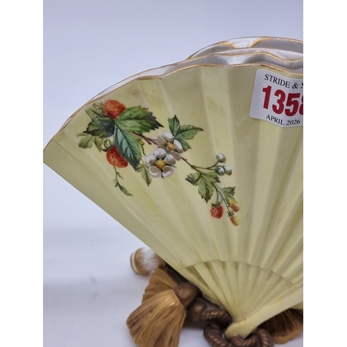 1358 - A very unusual pair of Victorian Royal Worcester fan vases, circa 1880, each painted with wildflower... 