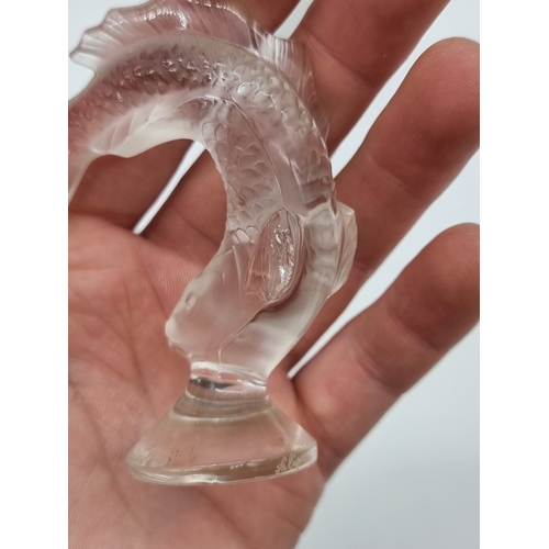 1359 - A Lalique frosted glass owl, 8.5cm high; together with three Lalique koi fish, (chips to all three);... 