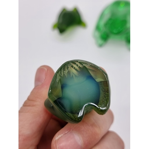 1360 - An interesting group of glass animals, comprising: a Baccarat green glass frog, 7cm high; a similar ... 