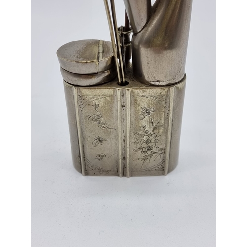1363 - A Chinese nickel plated opium pipe, 25.5cm high.
