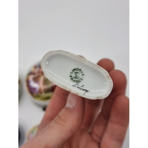 1367 - A Georgian enamel circular box, 4.2cm diameter; together with two further enamel boxes; a small Roya... 