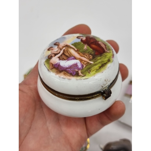 1367 - A Georgian enamel circular box, 4.2cm diameter; together with two further enamel boxes; a small Roya... 