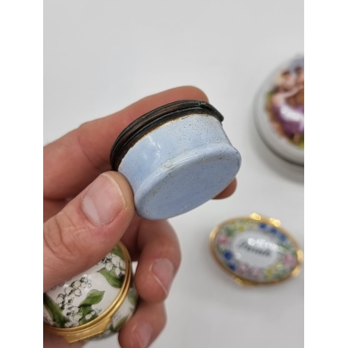 1367 - A Georgian enamel circular box, 4.2cm diameter; together with two further enamel boxes; a small Roya... 