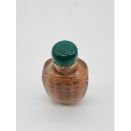 1374 - A Chinese internally painted rock crystal snuff bottle, 19th century, of panelled form, painted with... 