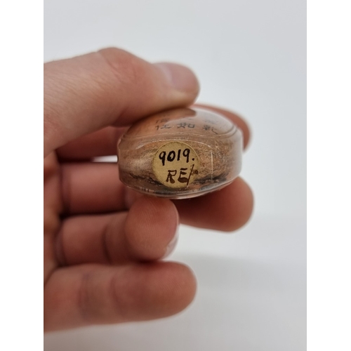 1374 - A Chinese internally painted rock crystal snuff bottle, 19th century, of panelled form, painted with... 