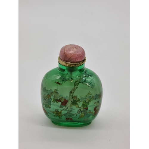 1376 - Two Chinese internally painted glass snuff bottles and hardstone stoppers, probably 19th century, ea... 