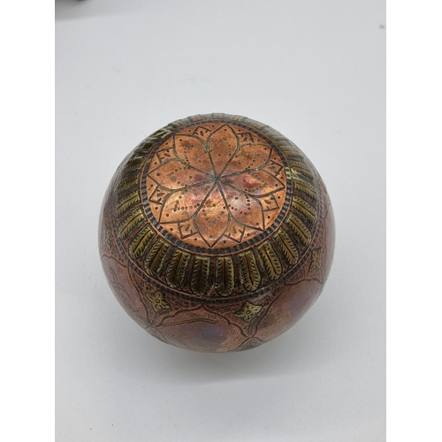 1382 - A small group of Oriental works of art, to include cloisonne enamel. (4)