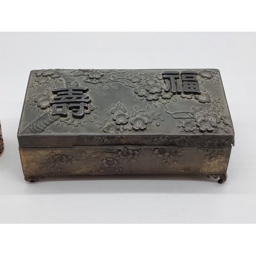 1382 - A small group of Oriental works of art, to include cloisonne enamel. (4)