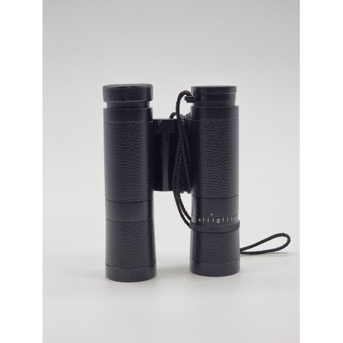 1394 - A pair of Leica 10x25 BC binoculars, (faults).&nbsp;