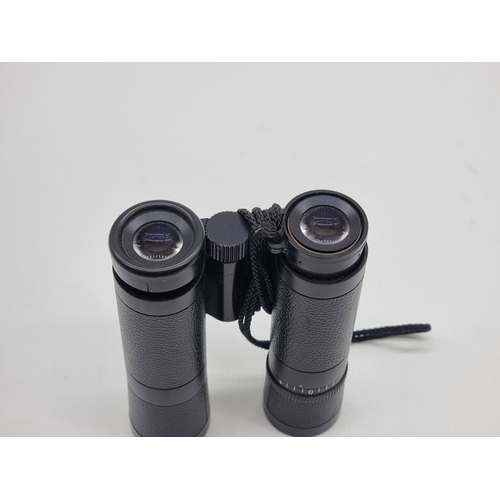 1394 - A pair of Leica 10x25 BC binoculars, (faults).&nbsp;