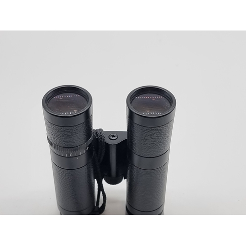 1394 - A pair of Leica 10x25 BC binoculars, (faults).&nbsp;