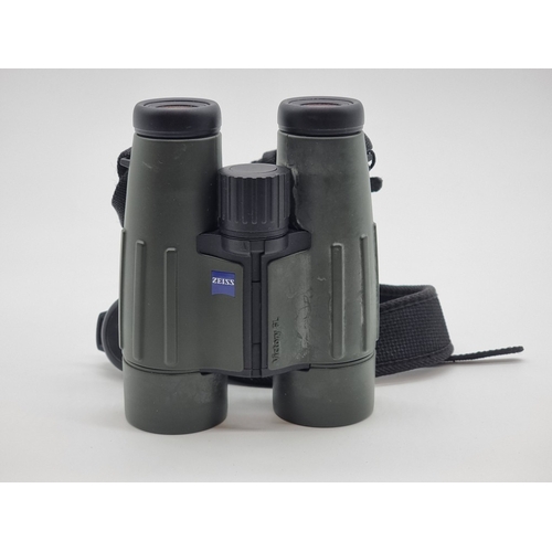 1396 - A pair of Zeiss Victory FL 8x42 binoculars, with lens caps and soft bag.