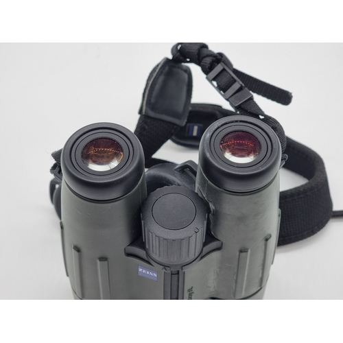 1396 - A pair of Zeiss Victory FL 8x42 binoculars, with lens caps and soft bag.
