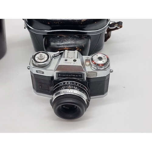 1397 - A pair of Carl Zeiss 8x50 B binoculars, in brown leather case; together with a Contaflex S camera, w... 