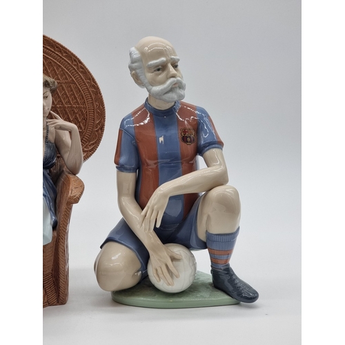 1409 - A Nao figure of Avi del Barca, No.1155, 29.5cm high; together with a Nadal figure of a seated lady, ... 