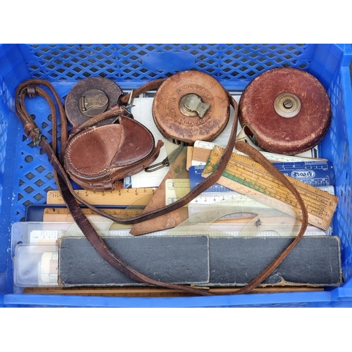 1423 - A collection of surveyors rules and measures; together with a WWI pocket compass, in leather case.... 