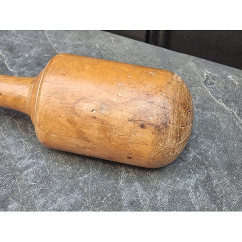 1424 - A large treen mallet, 38.5cm long, (splits).
