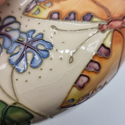 1444 - A Moorcroft 'Butterfly' pattern vase, by Sally Tuffin, 11.5cm high, boxed, (minor crazing).... 