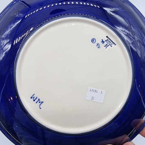 1446 - A Moorcroft 'Phoenix' pattern plate, 26.5cm diameter, boxed.