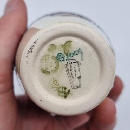 1452 - A Moorcroft 'Mediterranean Cherries' pattern vase, by Kerry Goodwin, 13.5cm high, boxed.... 