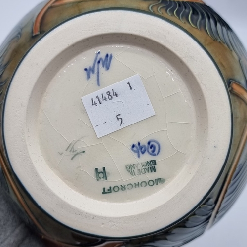 1453 - A Moorcroft 'Phoenix' pattern vase, by Rachel Bishop, 15.5cm high, boxed.