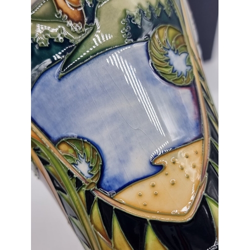1454 - A Moorcroft 'Landscape Medley' pattern vase, 21cm high, (some crazing), boxed.