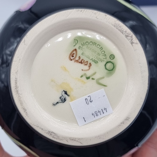 1456 - A Moorcroft 'Daydream' pattern vase, 10.5cm high, boxed.