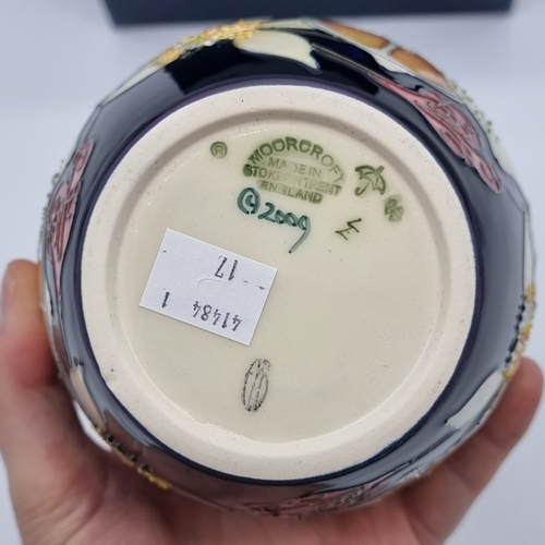 1459 - A Moorcroft 'Lemons' pattern ginger jar and cover, 15.5cm high, boxed.&nbsp;