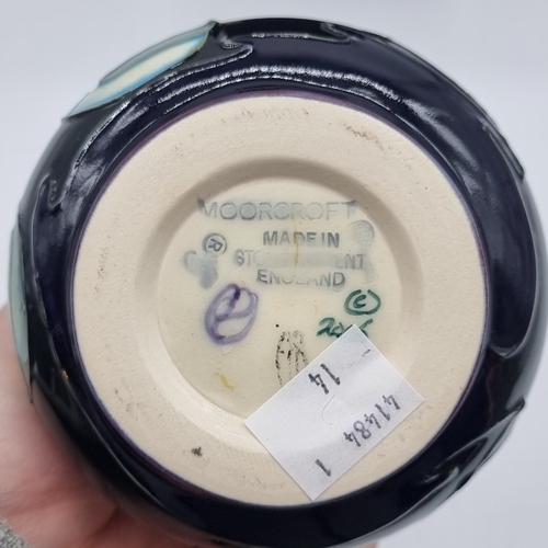 1464 - A Moorcroft 'New Dawn' pattern bottle vase, 20.5cm high, boxed.