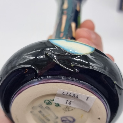 1464 - A Moorcroft 'New Dawn' pattern bottle vase, 20.5cm high, boxed.