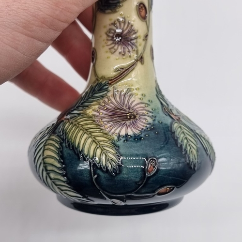 1465 - A Moorcroft 'Fiji' pattern bottle vase, No.435, by Emma Bossons, 20.5cm, boxed.