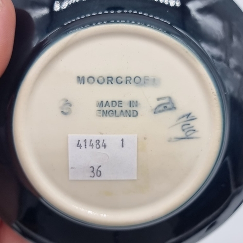 1469 - Five small Moorcroft dishes, comprising: 'Cluny'; 'Anna Lily'; 'Pansy'; 'Violet'; and 'Bramble' patt... 