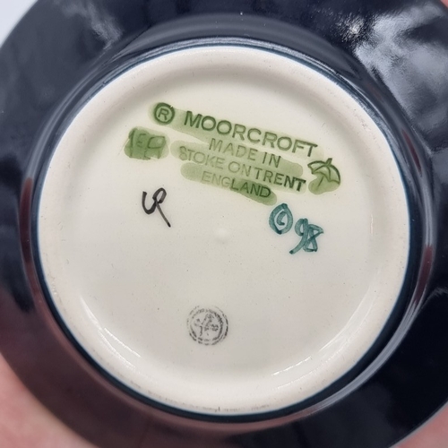 1469 - Five small Moorcroft dishes, comprising: 'Cluny'; 'Anna Lily'; 'Pansy'; 'Violet'; and 'Bramble' patt... 