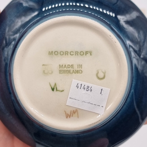 1469 - Five small Moorcroft dishes, comprising: 'Cluny'; 'Anna Lily'; 'Pansy'; 'Violet'; and 'Bramble' patt... 