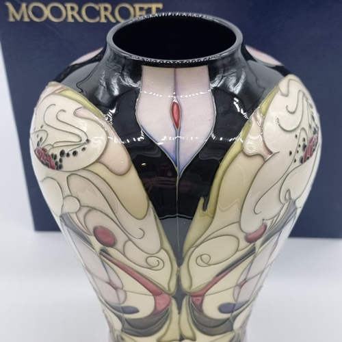 1471 - A Moorcroft 'White Rose' pattern vase, by Emma Bossons, signed, dated 2004 and numbered 16/300, 21.5... 