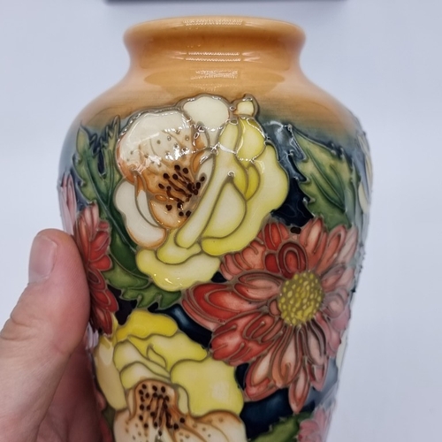1472 - A Moorcroft 'Victoriana' pattern vase, by Emma Bossons, signed, 21cm high, boxed.