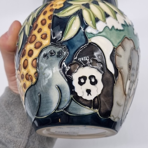 1477 - A Moorcroft 'Noah's Ark' pattern ginger jar and cover, by Rachel Bishop, 15.5cm high, boxed.... 