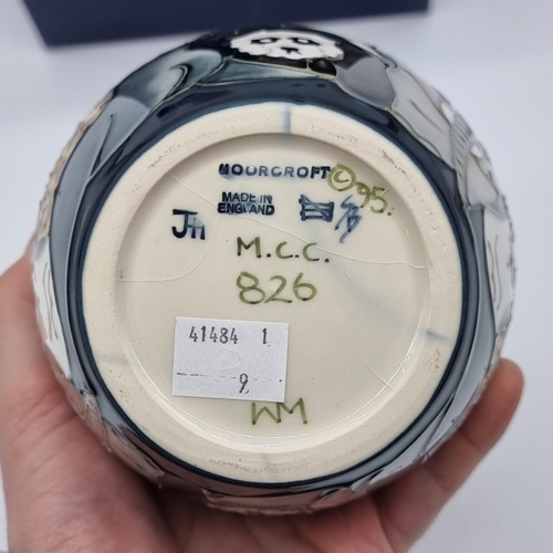 1477 - A Moorcroft 'Noah's Ark' pattern ginger jar and cover, by Rachel Bishop, 15.5cm high, boxed.... 