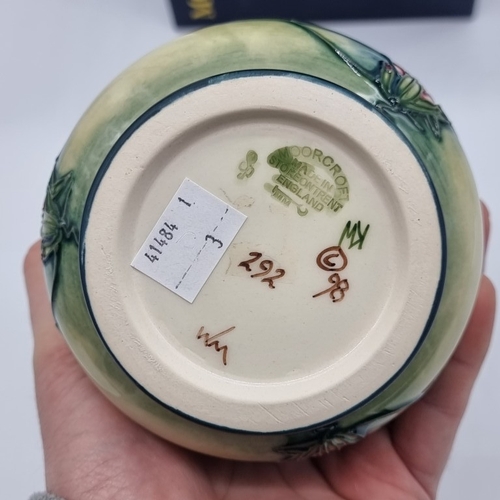 1479 - A Moorcroft 'Kiribati' pattern vase, by Nicola Slaney, 20.5cm high, boxed.